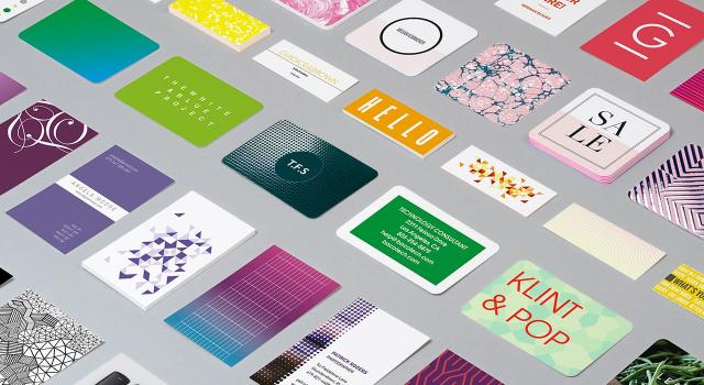 Mosaic of Business Cards in various designs on grey background