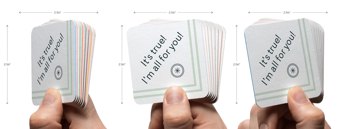 Hand holding luxe square rounded corners business card at different angles