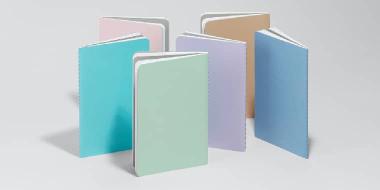 Pile of 6 softcover journals in 6 different colors