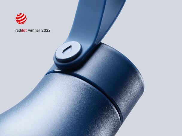 Midnight Blue MOO Water Bottle alongside the Red Dot Design Award logo