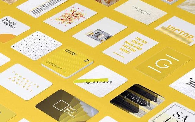 Mosaic of Super strong Business Cards in various sizes and designs and with rounded or square corners on yellow background