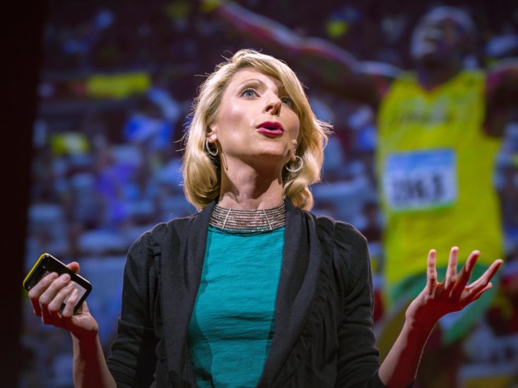 Amy Cuddy giving her TED Talk about how your body language shapes who you are