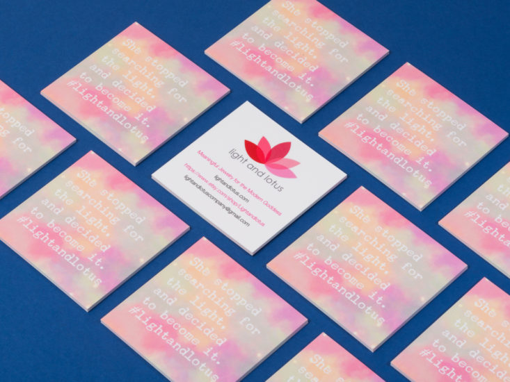 The Light and Lotus business cards laid flat