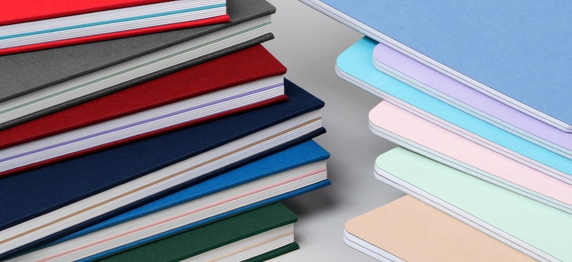 Soft and hard cover notebooks in various colors