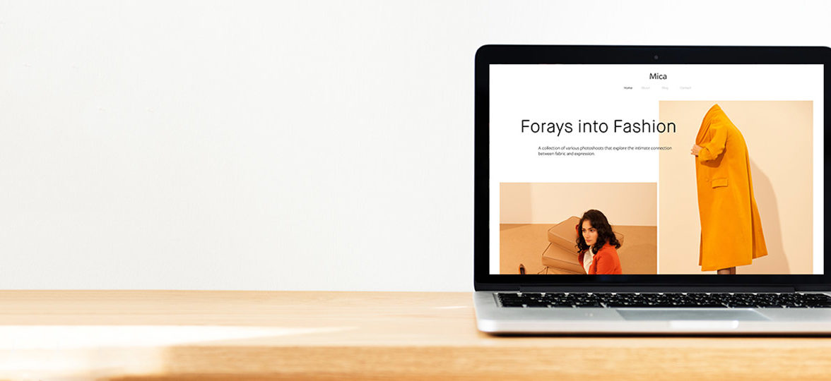 Fashion photography website on laptop