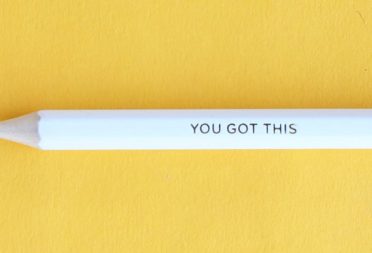 White pencil with You Got This marking on yellow background