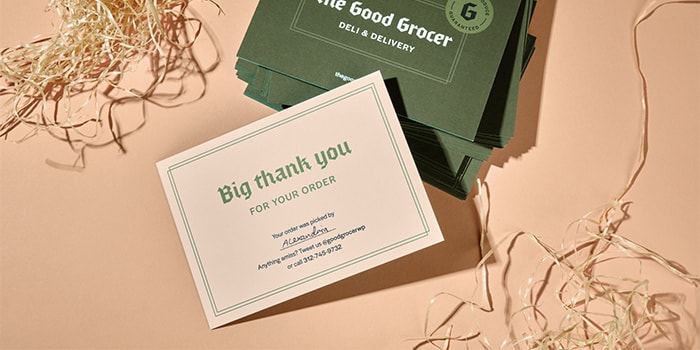 Grocery shop thank you postcard with a green back and a beige front