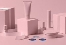 Pink packaging for beauty products and blue stickers
