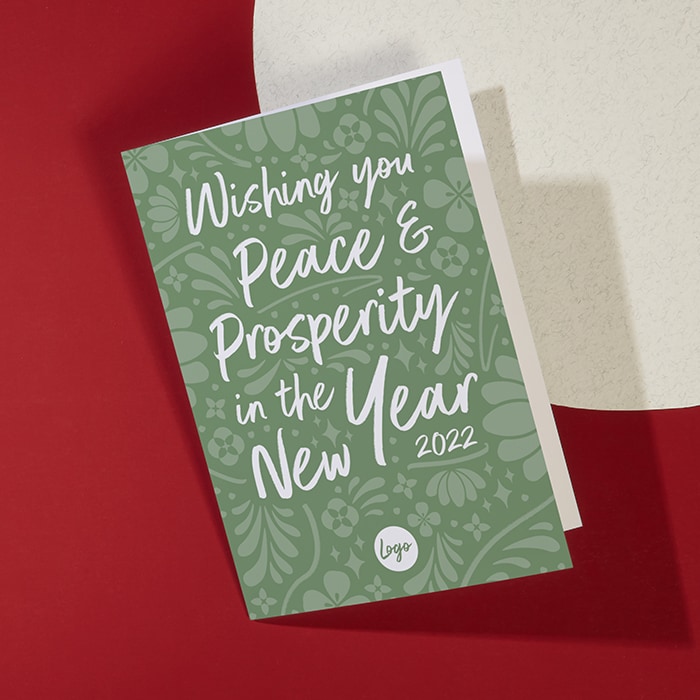 Green Chinese new year greeting card with peace and prosperity message