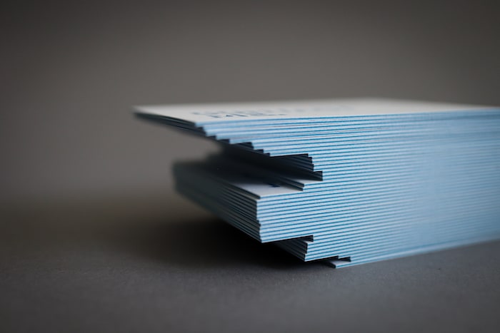 Pile Luxe business cards with a blue edge by Melanie Martin