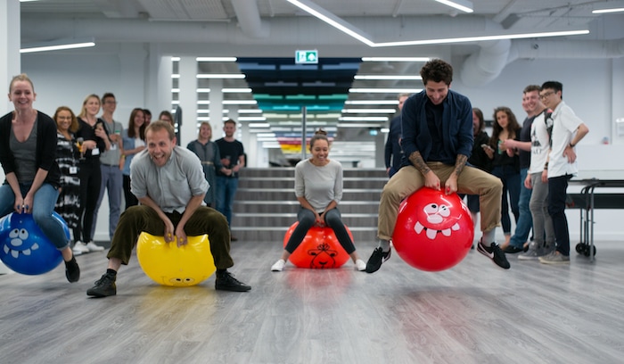 MOO employees playing in the office