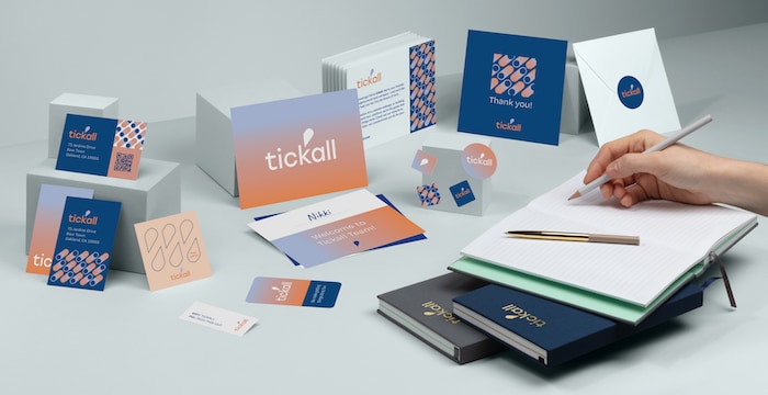 Suite of marketing materials in blue and coral tones