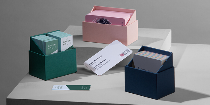 Green, pink and dark blue presentation boxes for business cards and note cards