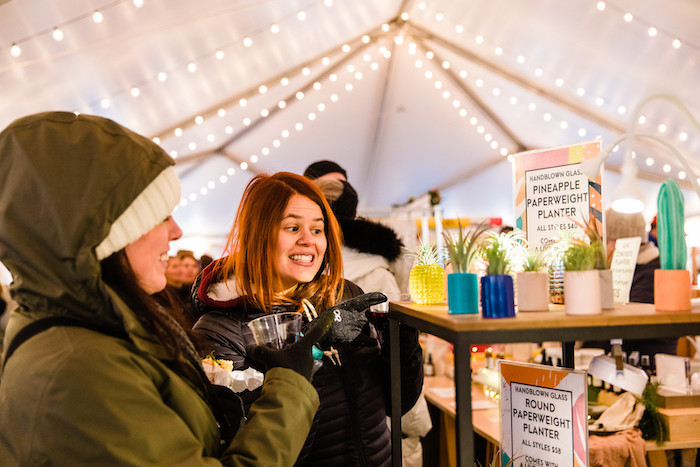 People looking at stalls at the Sowa Boston winter festival