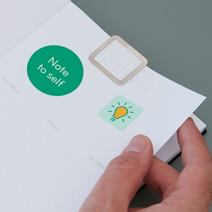 Custom Stickers inside a work planner.