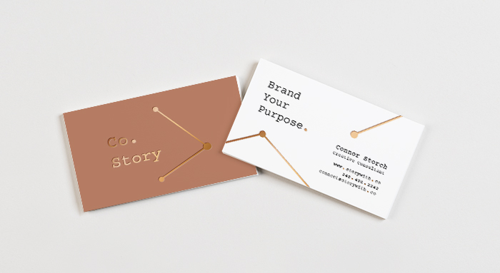 Co.Story Business cards with Copper Foil logo.