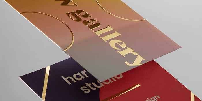 A gold foil Business Card close up to show the detail of the design and paper texture