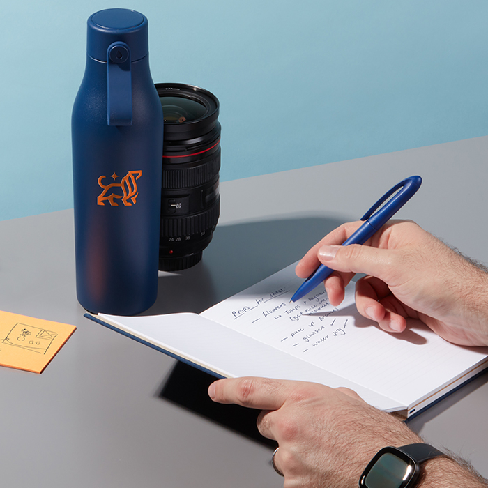 Big Leo's Branded merchandise, including MOO Water Bottle and Hardcover Notebook.