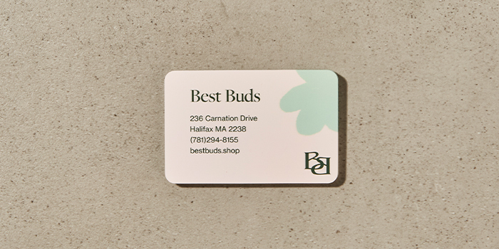 A MOO Business Card with a rounded corner finish for a floral brand 
