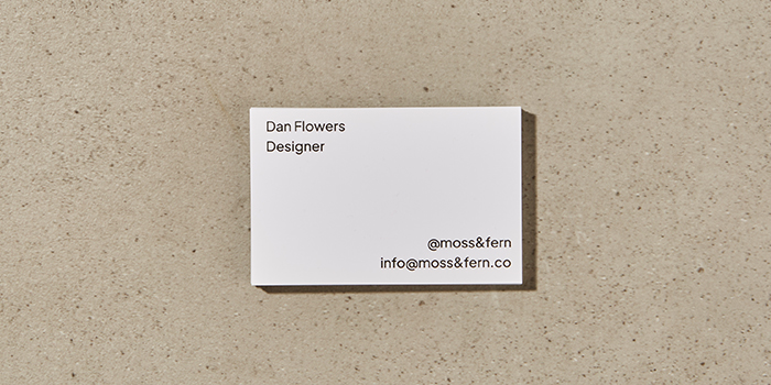 A simplistic, monochrome MOO Business Card design for a flower shop