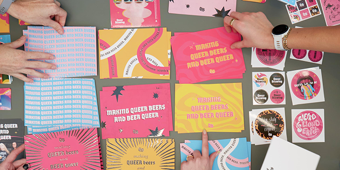 MOO designed a whole suite of print for Queer Brewing.