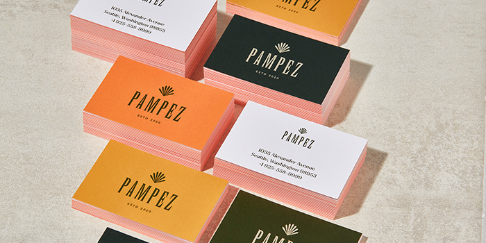Several stacks of the best business cards made by MOO.
