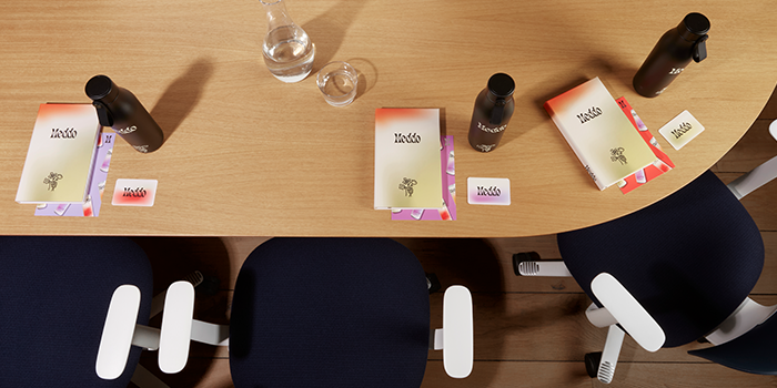 Quality branded merch from MOO in a meeting.