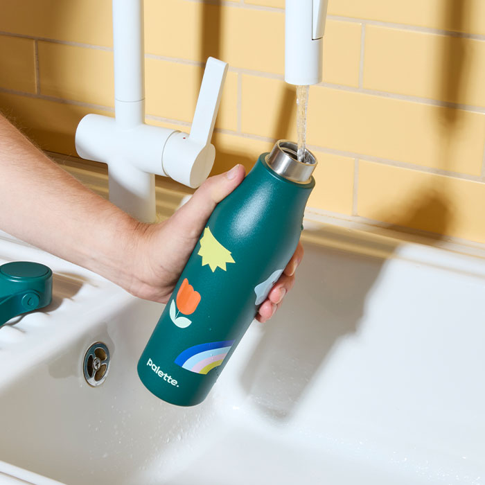 Someone filling up their Water Bottle.