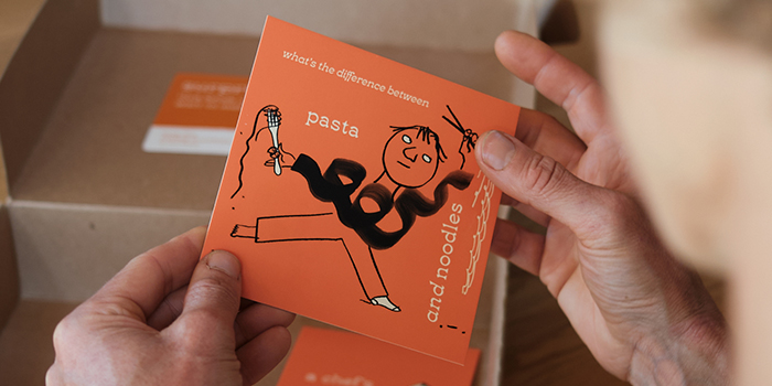 Tara holding a Luxe Notecard.