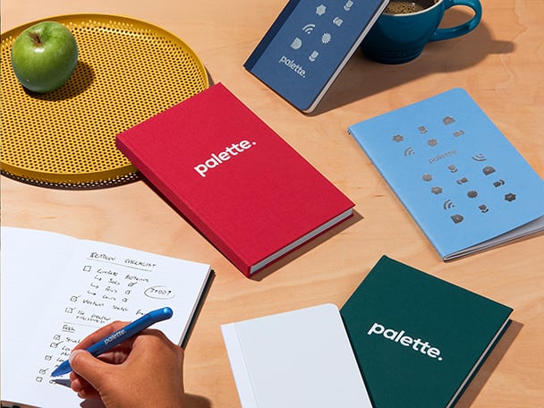 A selection of the MOO Notebook range including t he Tape Bound Notebook, MOO Softcover Notebook and the Hardcover Notebook