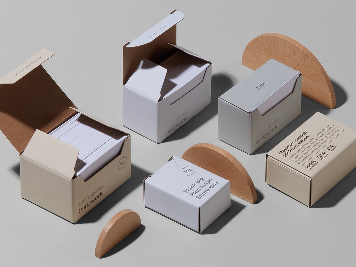MOO\'s recyclable packaging for business cards including plastic-free boxes in various sizes and colours