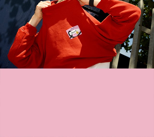 A name tag sticker on a jumper