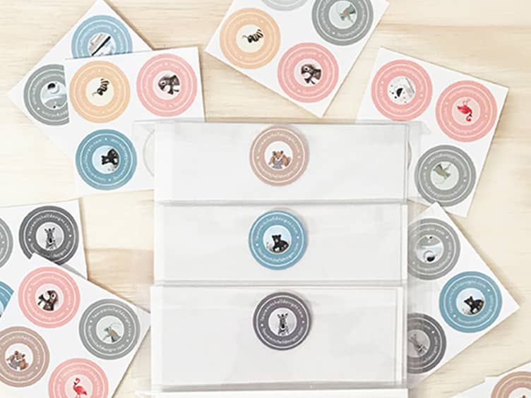 Power up your packaging with custom Stickers & Postcards