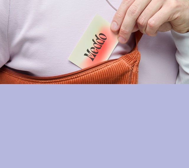 Business cards being pulled out from a bag