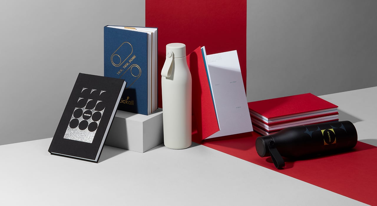 A selection of custom and non-custom products including Planners, Water Bottles and Notebooks
