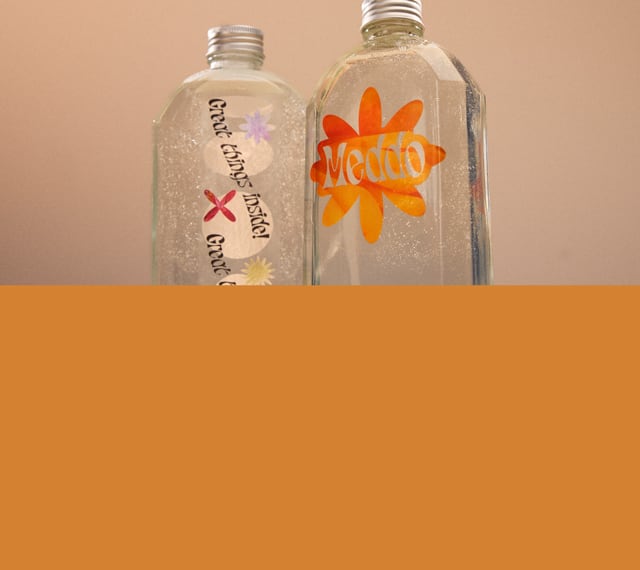 Clear Stickers on display on various bottles