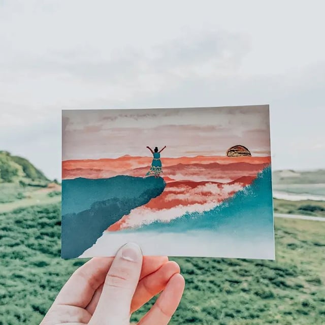Hand holding a custom postcard