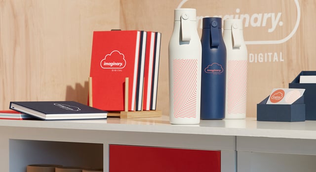 A selection of branded merchandise, including Water Bottles and Notebooks