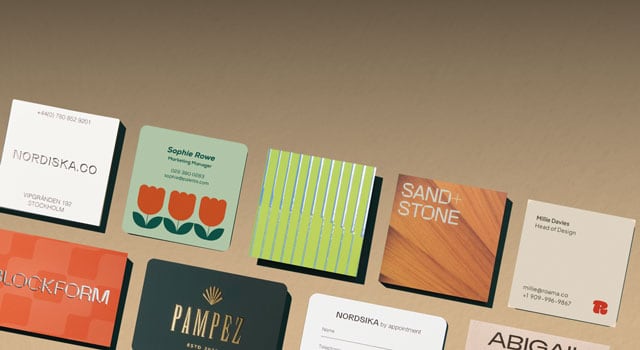 A range of business cards on a beige background