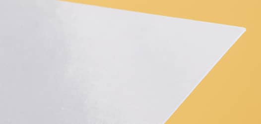 Premium glossy flyer paper on yellow background