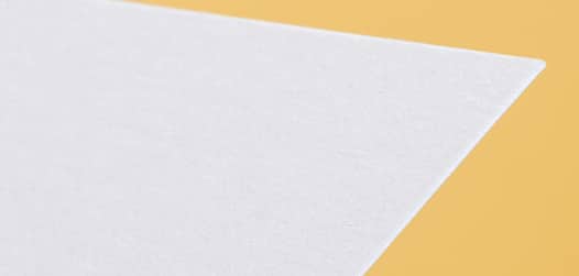 Premium matte flyer paper on yellow background