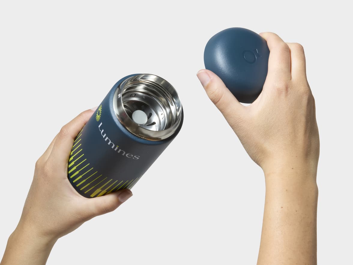 Hands Removing Lid From Stone Blue Fellow® Carter Move Mug With 360 Wrap Printing Customisation