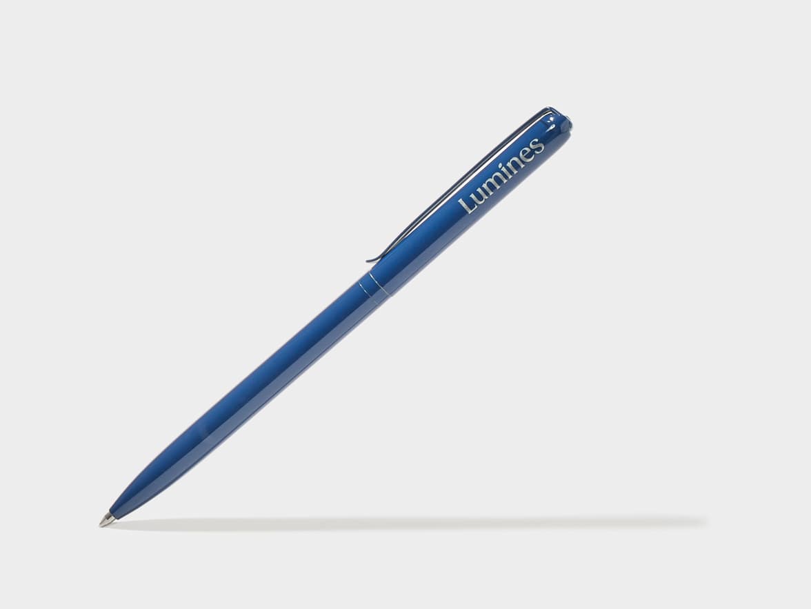 A blue pen branded 'Lumines'.