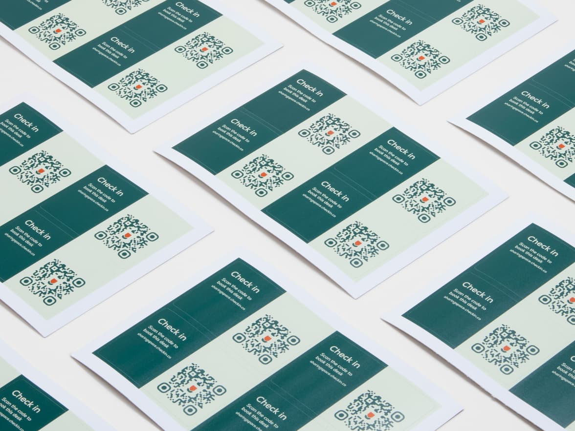 A collection of rectangular coated stickers with dark and light green customization.