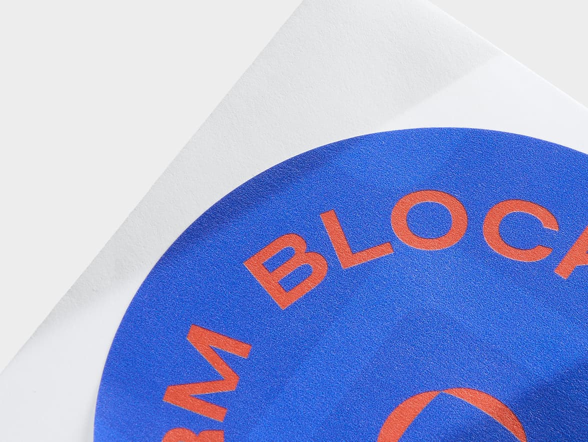 A close up image of a customized round matte paper sticker in size 4 inch.