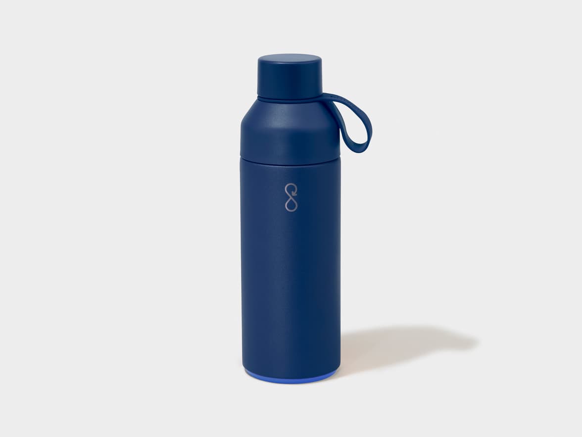 Dark blue water bottle with a stylized loop logo on the side and a lighter blue ring at the base.