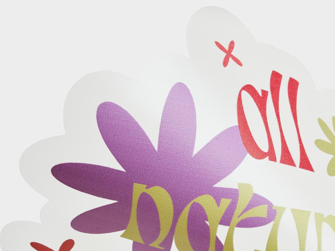 A close up image of a customized clear sticker with flowers on it.