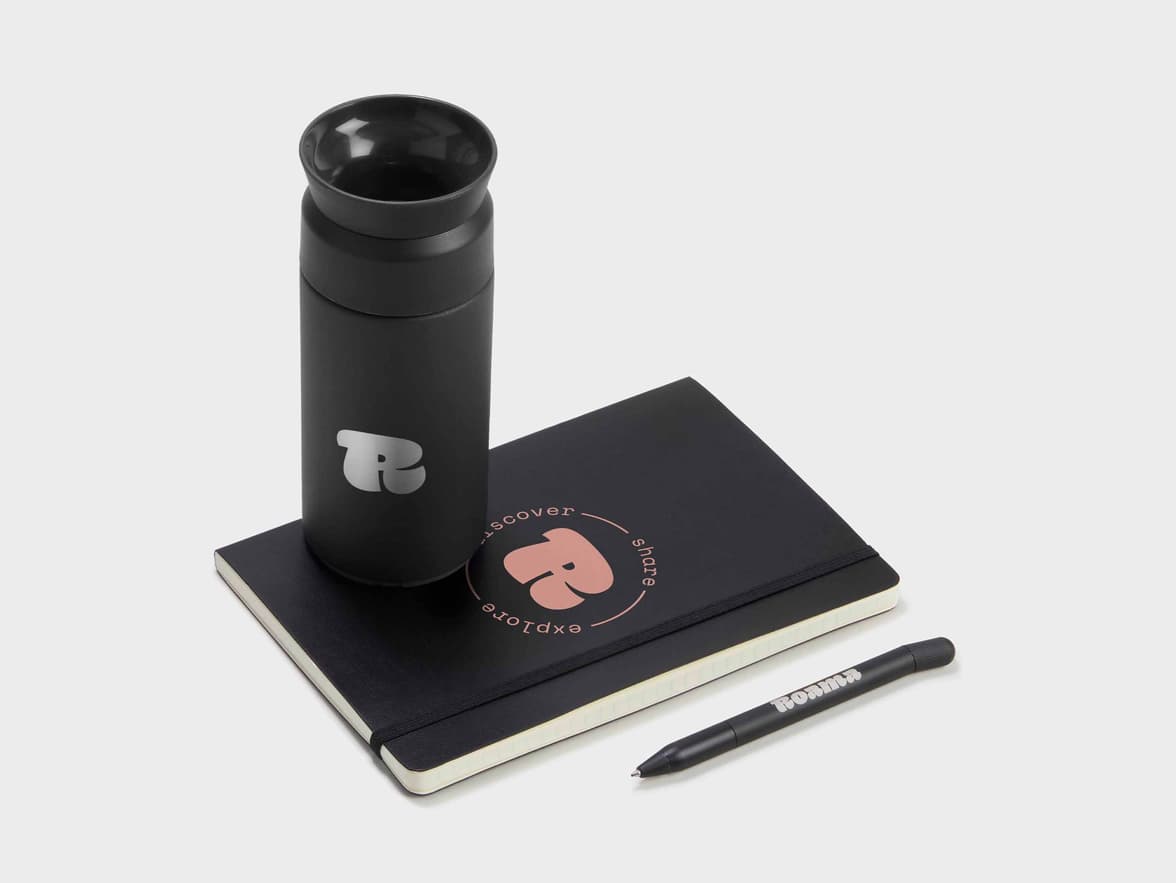 Collection shot of the Black LEUCHTTURM1917 Classic Softcover Notebook with a Tumbler and a Pen