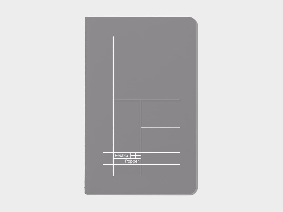 Charcoal grey soft cover journal with white foil pattern