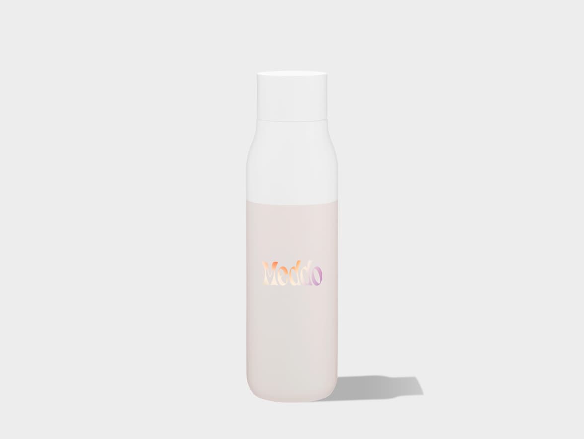 A tall, two-toned bottle, white on top and light pinkish-beige on the bottom, stands upright against a plain light gray background. The word 'Moddo' is written in a gradient of orange, pink, and purple on the lower section of the bottle, and a subtle shadow extends to the right.